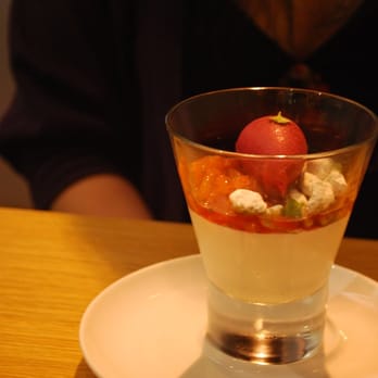 Commis - goat's milk panna cotta with blood orange, powdered sugar pistachios, and beet blood orange sorbet - New American Near Me - Oakland, California Commis - goat's milk panna cotta with blood orange, powdered sugar pistachios, and beet blood orange sorbet - New American Near Me - Oakland, California