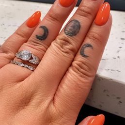 Manicure with glow in the dark orange Manicure with glow in the dark orange