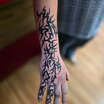 Tomahawk Tattoo - Piercing Near Me - Stillwater, Oklahoma Tomahawk Tattoo - Piercing Near Me - Stillwater, Oklahoma