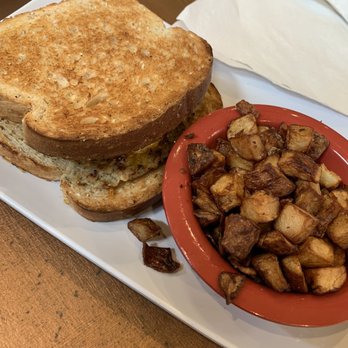 Ruby Slipper Decatur - Breakfast Sandwich with Breakfast Potatoes - Breakfast & Brunch Near Me - New Orleans, Louisiana Ruby Slipper Decatur - Breakfast Sandwich with Breakfast Potatoes - Breakfast & Brunch Near Me - New Orleans, Louisiana