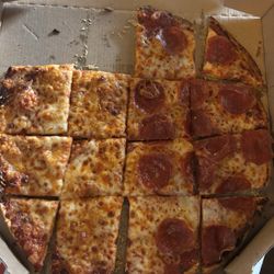 Domino's Pizza - Our over-cooked incorrect pizza.