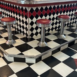 Rockin Johnny's Diner - Bar area, checkered tiles, retro style stools, facing downwards