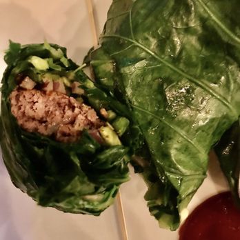 Burger Village - Collard green wrapped burger with raw jalapeno raw onion and cheese - Burgers Near Me - Brooklyn, New York