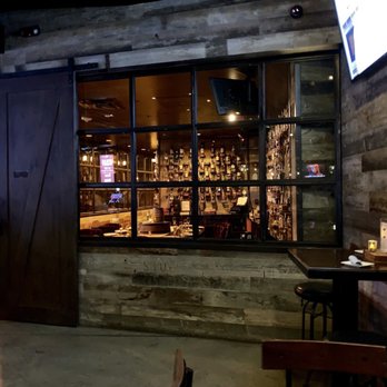 Bosscat Kitchen & Libations - Private room with whiskey wall - New American Near Me - Houston, Texas Bosscat Kitchen & Libations - Private room with whiskey wall - New American Near Me - Houston, Texas
