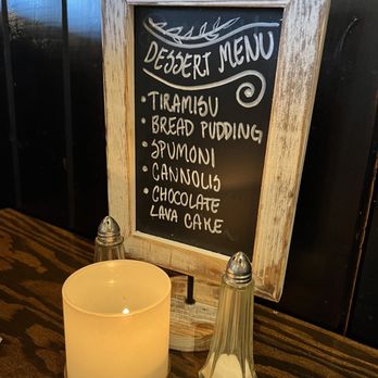 Ulivo Restaurant - a candle and menu board - Italian Near Me - San Diego, California Ulivo Restaurant - a candle and menu board - Italian Near Me - San Diego, California
