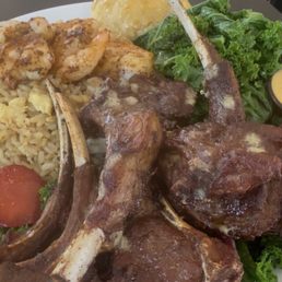 Grilled lamb chops , kale , shrimp fried rice and butter biscuit .