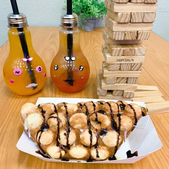 Mr Tea - "One cup sunshine" with mango popping boba, white peach green tea with strawberry popping boba & chocolate waffle - Bubble Tea Near Me - Las Vegas, Nevada Mr Tea - "One cup sunshine" with mango popping boba, white peach green tea with strawberry popping boba & chocolate waffle - Bubble Tea Near Me - Las Vegas, Nevada