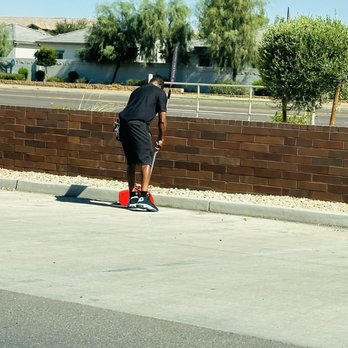 Cobblestone Auto Spa - This is Hakeem; cleaning up the space around him - which is brilliant as to keep his area from getting dirty from those outside sources. - Car Wash Near Me - Tolleson, Arizona