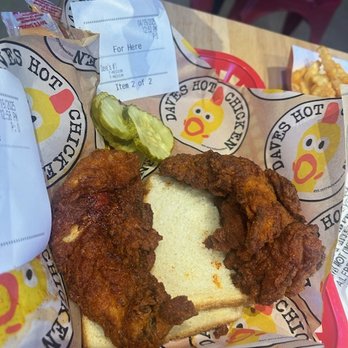 Dave's Hot Chicken - Chicken tenders served on a slice of white bread. - Chicken Shop Near Me - Las Vegas, Nevada Dave's Hot Chicken - Chicken tenders served on a slice of white bread. - Chicken Shop Near Me - Las Vegas, Nevada
