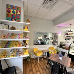 Groovy Duck Bakery - The famous rubber duck wall and seating area
