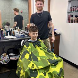 Paramount Barbering - My son after his cut with the barber Matt.