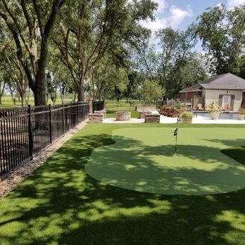 Beau Monde Landscape - Artificial turf with putting green installation by Beau Monde - Landscaping Near Me - Lafayette, Louisiana