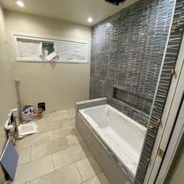 Tile will arrive soon and will be installed on the tub surround. Tile will arrive soon and will be installed on the tub surround.
