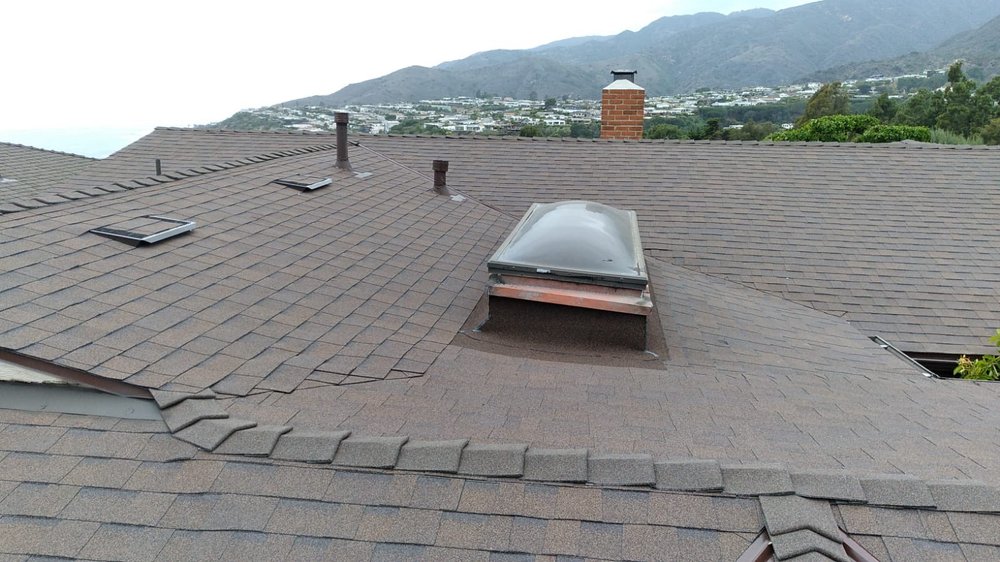 Slide of D.B Roofing