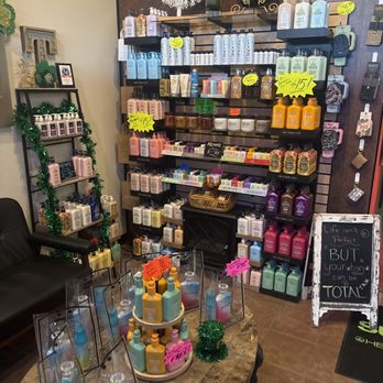 Total Tan - Wall of supplies - Spray Tanning Near Me - Kansas City, Missouri Total Tan - Wall of supplies - Spray Tanning Near Me - Kansas City, Missouri