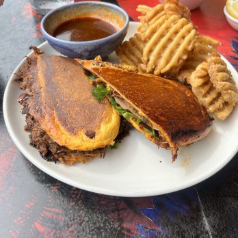 Kaya - Cuban Birria sandwich with waffle fries - Caribbean Near Me - Pittsburgh, Pennsylvania Kaya - Cuban Birria sandwich with waffle fries - Caribbean Near Me - Pittsburgh, Pennsylvania