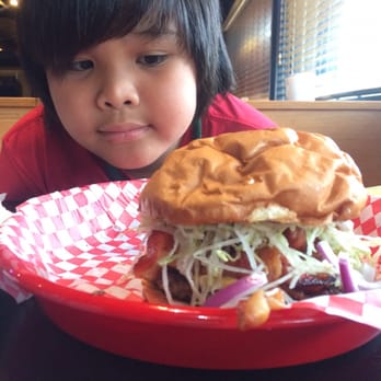 Beyond Burger - Mile High burger--my brother added the coleslaw, shredded lettuce, melted cheddar cheese for free. - Burgers Near Me - Texas City, Texas Beyond Burger - Mile High burger--my brother added the coleslaw, shredded lettuce, melted cheddar cheese for free. - Burgers Near Me - Texas City, Texas