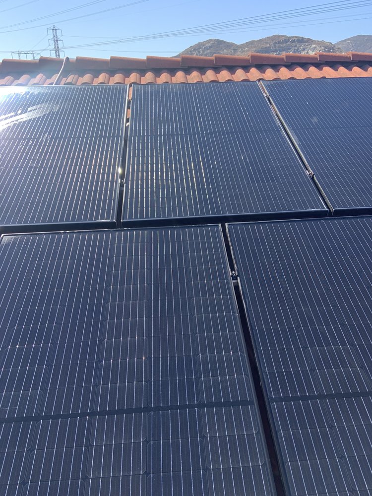 Slide of Roof Doctor Solar Panel Cleaning
