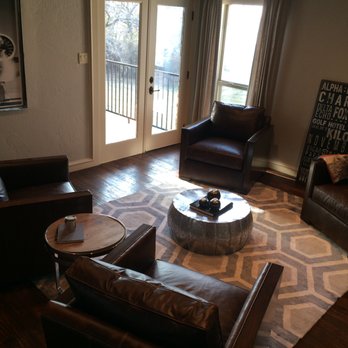 HSW Floors - a living room with leather furniture - Flooring Near Me - Little Elm, Texas HSW Floors - a living room with leather furniture - Flooring Near Me - Little Elm, Texas