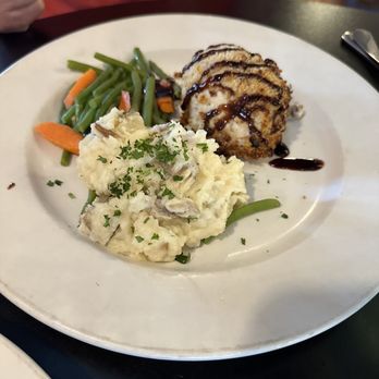 Cafe Lola - Stuffed Chicken with Cranberry-Walnut Crust - New American Near Me - Johnson City, Tennessee Cafe Lola - Stuffed Chicken with Cranberry-Walnut Crust - New American Near Me - Johnson City, Tennessee