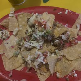 Nachos Chips & Queso with Seasoned Ground Beef I give these nachos a 10 out 10 They were prepared perfectly. The chips were not soggy. Nachos Chips & Queso with Seasoned Ground Beef I give these nachos a 10 out 10 They were prepared perfectly. The chips were not soggy.