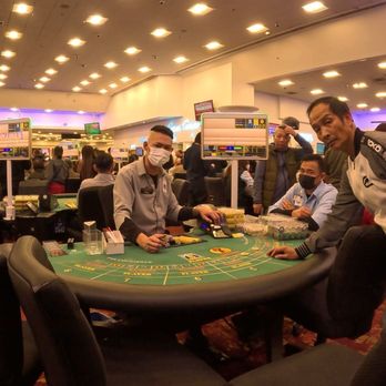 The Commerce Casino & Hotel - Left hand side is the floor manager, the dealer who pulled the trick in the center! - Casinos Near Me - Commerce, California The Commerce Casino & Hotel - Left hand side is the floor manager, the dealer who pulled the trick in the center! - Casinos Near Me - Commerce, California