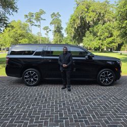 AndCam Transport Service - Executive chauffeur service with luxury SUV transportation for airport transfers, corporate travel, and special events.
