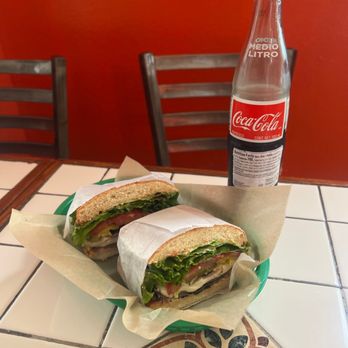 The Salad Place - BBQ Beef Sandwich with provolone and a 1 liter Mexican coke - American Near Me - San Francisco, California The Salad Place - BBQ Beef Sandwich with provolone and a 1 liter Mexican coke - American Near Me - San Francisco, California
