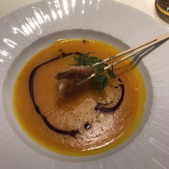 Restaurant Rise - Cream of pumpkin soup with a coconut battered shrimp for starters. - International Near Me - Frankfurt, HE Restaurant Rise - Cream of pumpkin soup with a coconut battered shrimp for starters. - International Near Me - Frankfurt, HE