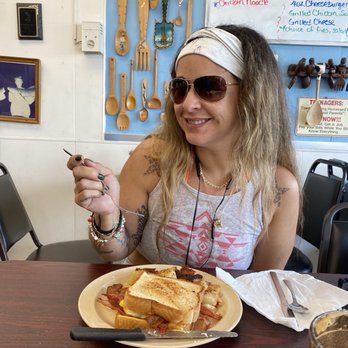 Wooden Spoon - My beautiful daughter enjoying egg, cheese bacon on Texas toast with homemade fries. - American Near Me - Marathon, Florida Wooden Spoon - My beautiful daughter enjoying egg, cheese bacon on Texas toast with homemade fries. - American Near Me - Marathon, Florida