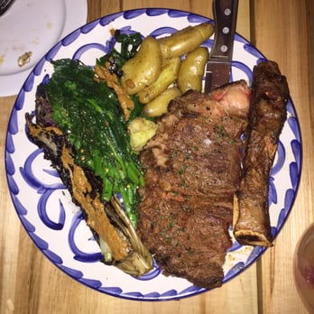 Tapagria Spanish Tapas - 32 oz rib eye in medium rare with potatoes and veggies. - Spanish Near Me - Markham, Ontario Tapagria Spanish Tapas - 32 oz rib eye in medium rare with potatoes and veggies. - Spanish Near Me - Markham, Ontario