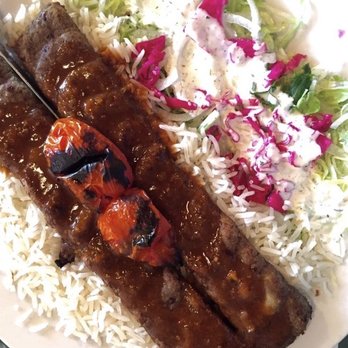 Zand's Persian Kebabs - Lamb Kebabs with salad with an excellent garlic sauce. - Persian/Iranian Near Me - Bryan, Texas Zand's Persian Kebabs - Lamb Kebabs with salad with an excellent garlic sauce. - Persian/Iranian Near Me - Bryan, Texas