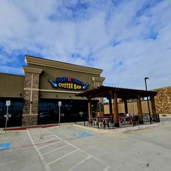 Fish N Tails Oyster Bar - Front of restaurant with plenty of parking space.