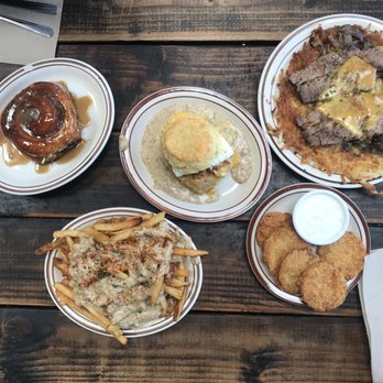 Pine State Biscuits - Cinnamon roll, Reggie deluxe, hash ups with steak, cajun fries and fried tomatoes. - Southern Near Me - Portland, Oregon