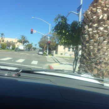 Mariscos German - a palm tree on a street corner - Food Trucks Near Me - San Diego, California