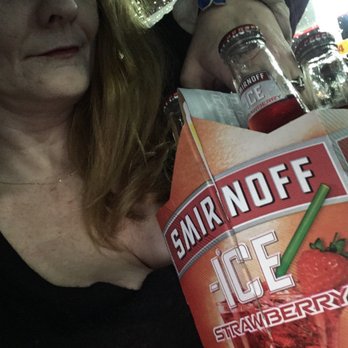Fieldstown Shell - a woman holding a bag of ice strawberry - Gas Stations Near Me - Gardendale, Alabama