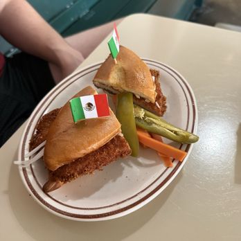 Casimiro - TORTA DE MILANESA - fried pork chop, chipotle mayo, refried beans, avocado, tomato and onion - Mexican Near Me - New Orleans, Louisiana