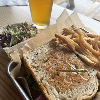 Revival Eastside Eatery - The Rachel w/ fries and side of broccoli slaw. - Sandwiches Near Me - Waco, Texas Revival Eastside Eatery - The Rachel w/ fries and side of broccoli slaw. - Sandwiches Near Me - Waco, Texas