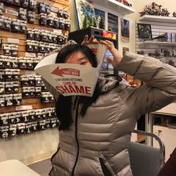 Tinker and Smithy Game Store - Krissy donning the cone of shame