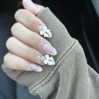 Tipsy Nails spa - Nails w/bow charm, pearl french tip by Kim - Nail Salons Near Me - Long Beach, California Tipsy Nails spa - Nails w/bow charm, pearl french tip by Kim - Nail Salons Near Me - Long Beach, California