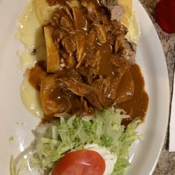 El Molcajete - Enchiladas rancheros with pork