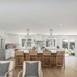 Excel Design and Build - Complete Kitchen Remodel in Laguna Hills , Ca with custom cabinetry, quartz countertops, and a spacious island.