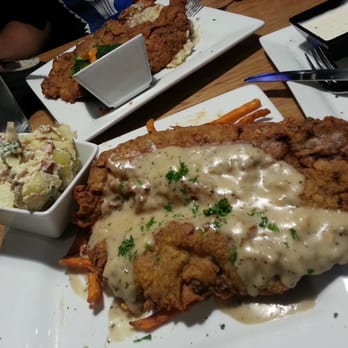 Bricktown Brewery - Chicken fried steak with bacon potato salad and sweet potato fries! - Breweries Near Me - Owasso, Oklahoma Bricktown Brewery - Chicken fried steak with bacon potato salad and sweet potato fries! - Breweries Near Me - Owasso, Oklahoma