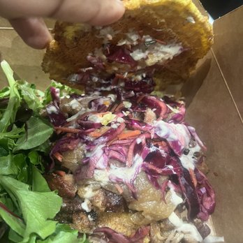 Bunnan - Plantain sandwich with pork (griot) - Haitian Near Me - Brooklyn, New York Bunnan - Plantain sandwich with pork (griot) - Haitian Near Me - Brooklyn, New York