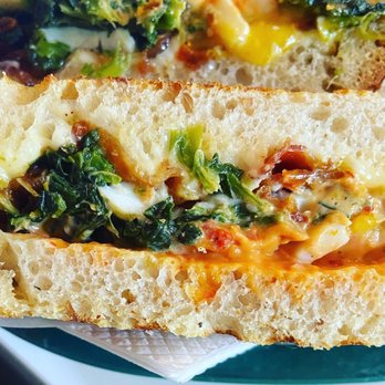 Volo Coffeehouse - Breakfast panini with bacon, egg, cheese, spinach and added sun dried tomato mayo - Coffee & Tea Near Me - Philadelphia, Pennsylvania