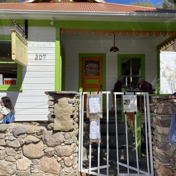 Thuy's Noodle Shop - a woman sitting on the porch - Vietnamese Near Me - Bisbee, Arizona