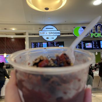 Sip + Spoon - a hand holding a cup of ice cream - Acai Bowls Near Me - Tacoma, Washington Sip + Spoon - a hand holding a cup of ice cream - Acai Bowls Near Me - Tacoma, Washington