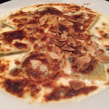 Trellis Restaurant - Susan's downfall: cheese & herb raviolis w/ Gorgonzola cheese-cream & toasted almonds. - Tuscan Near Me - Menlo Park, California Trellis Restaurant - Susan's downfall: cheese & herb raviolis w/ Gorgonzola cheese-cream & toasted almonds. - Tuscan Near Me - Menlo Park, California