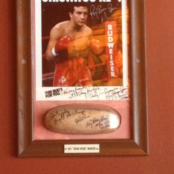 Tony Packo's - Boom boom Mancini's signed bun on Tony Packo's wall. - Hot Dogs Near Me - Toledo, Ohio