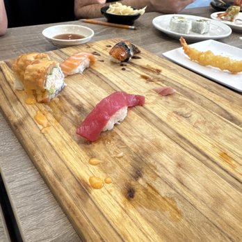 Hello Sushi Brea - Giant salmon roll and nigiri! So good we finished it in a flash! Snapped this pic before it was gone! - Japanese Near Me - Placentia, California